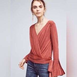 Anthropologie wrap top with bell sleeves
